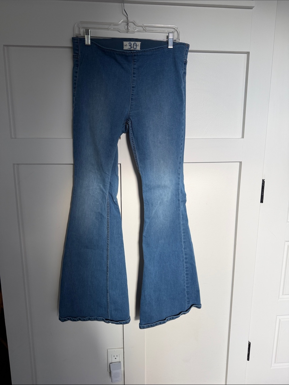 Free People Medium Blue Flare Jeans with Subtle Fade